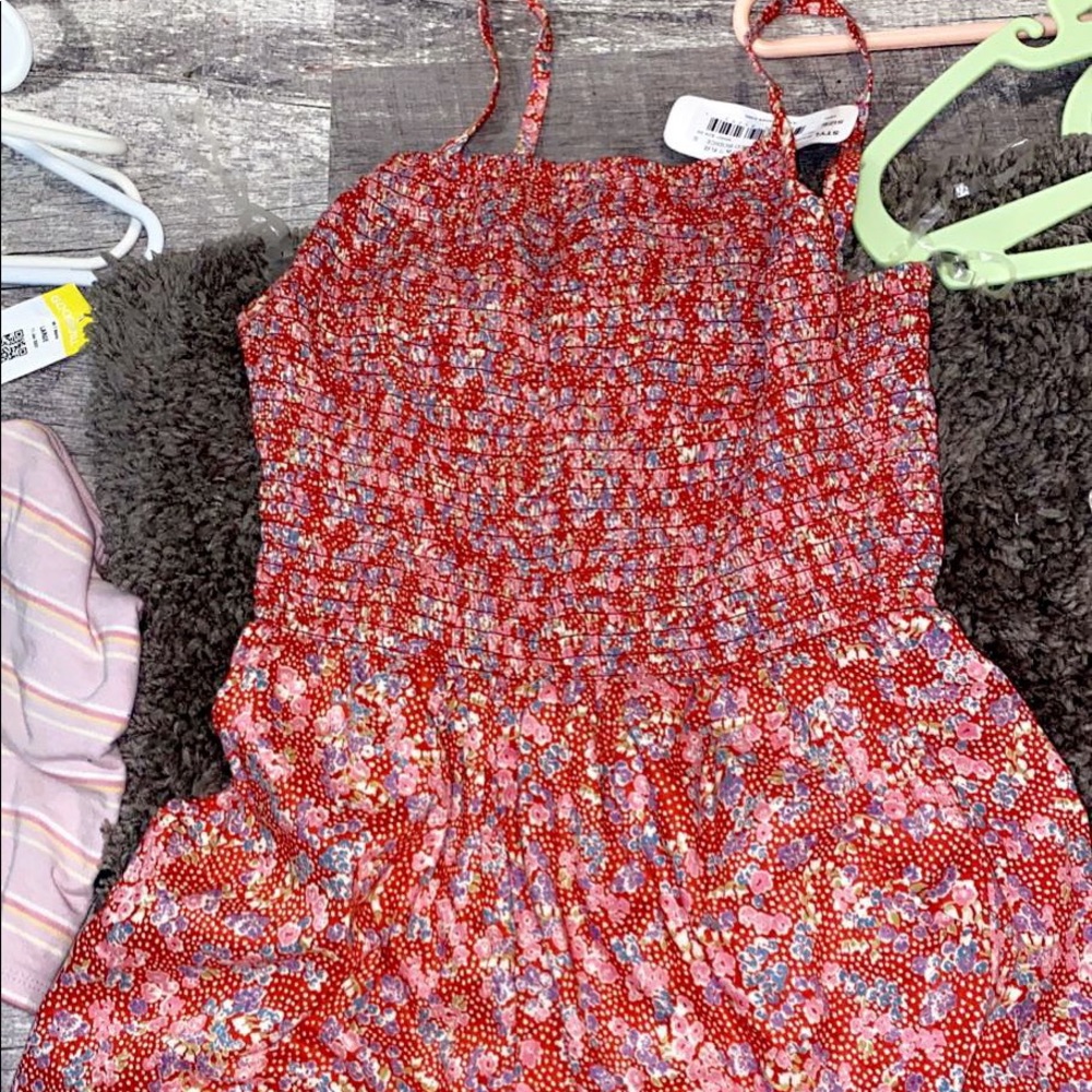 Red romper size small brand new with tag